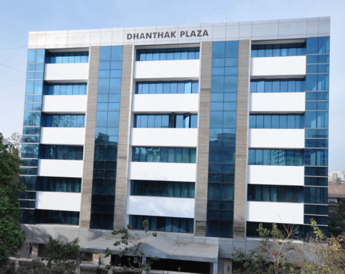 Dhanthak Plaza façade with signage
